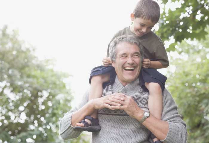 A mature woman stops for a rest during a run