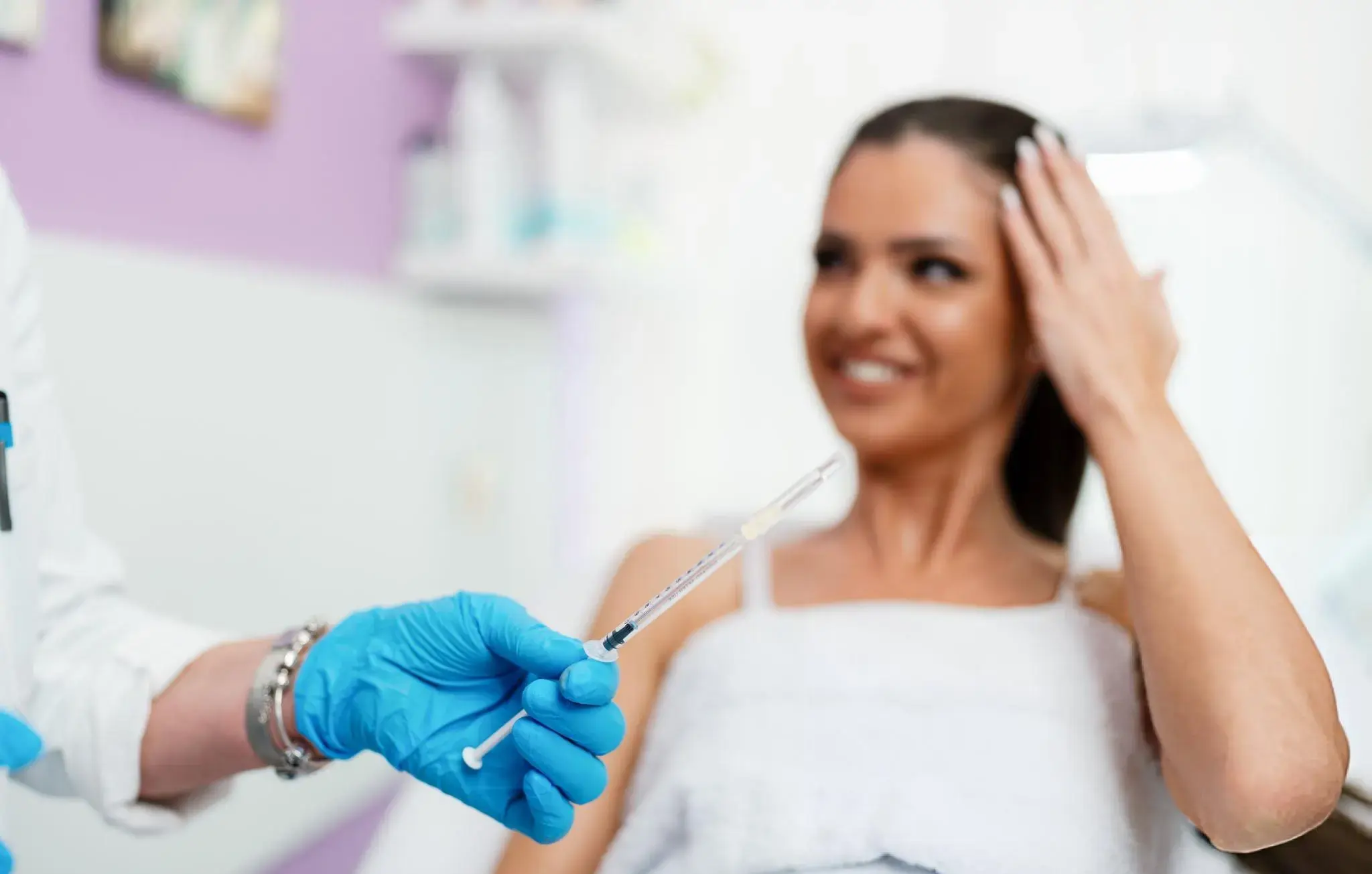 Smiling patient preparing for treatment—representing Mesquite’s personalized stem cell therapy consultation process